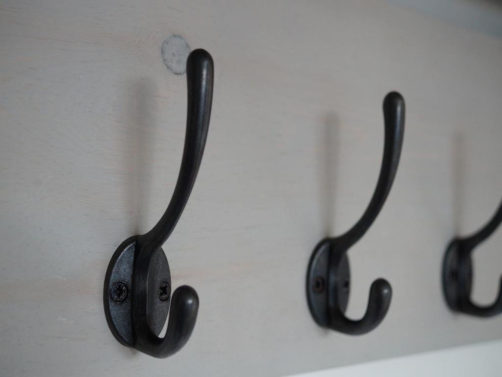 Close up view of black cast iron hooks